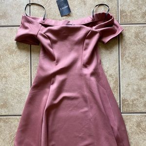 Off the shoulder light pink mini dress.